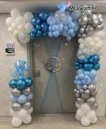 baby boy announcement decor with balloons and custom plaque