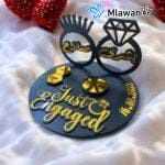 Wedding Ring Stand with dual-ring shapes and space for bracelet, perfect for engagements