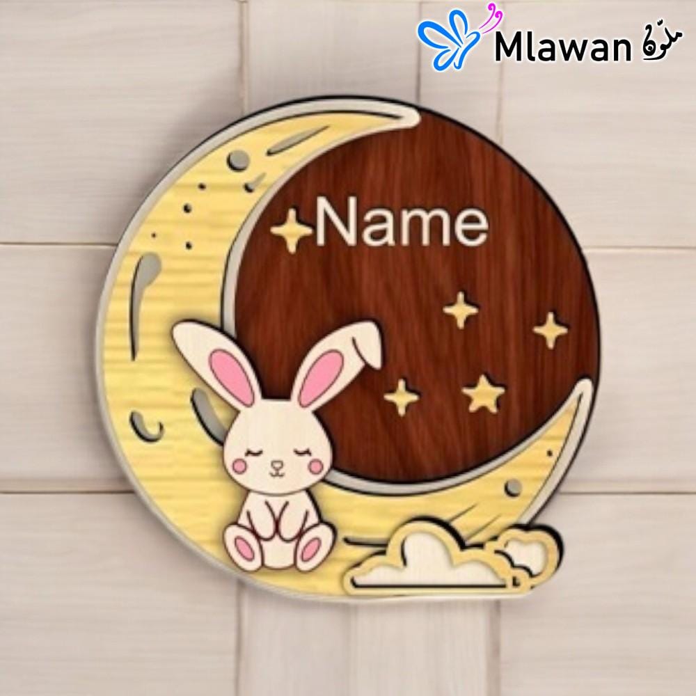 kids' name sign featuring crescent moon and bunny kids' name sign featuring crescent moon and bunny