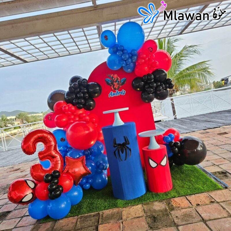 Spiderman balloons and themed backdrop