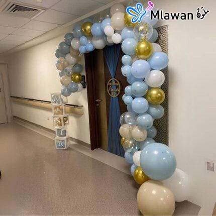 Elegant baby boy hospital room with balloon decorations