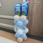 Vibrant balloon columns transforming hospital room for newborn celebration