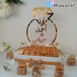 Personalized engravings on golden acrylic ring