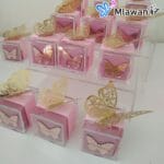 Elegant gold butterfly on clear acrylic box