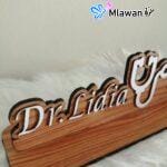 Personalized wooden doctor desk name plate in Arabic and English