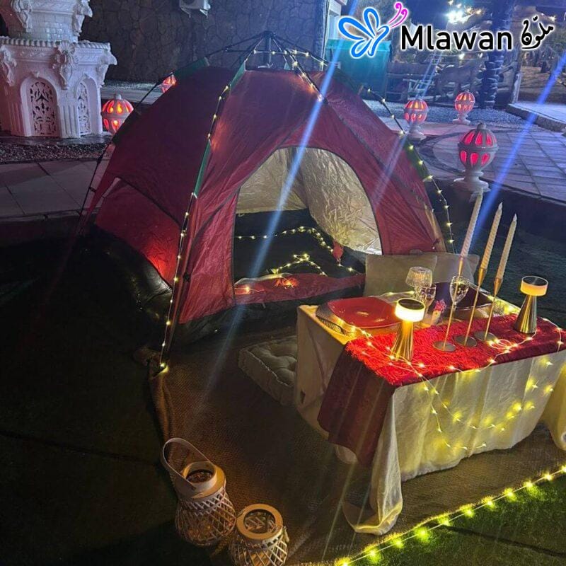 Anniversary celebration tent setup with soft lighting