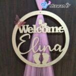 Custom baby name sign with balloon arrangements for newborn welcome