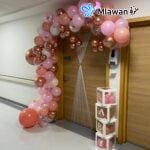 Ceiling balloons installation for newborn baby hospital room decoration service