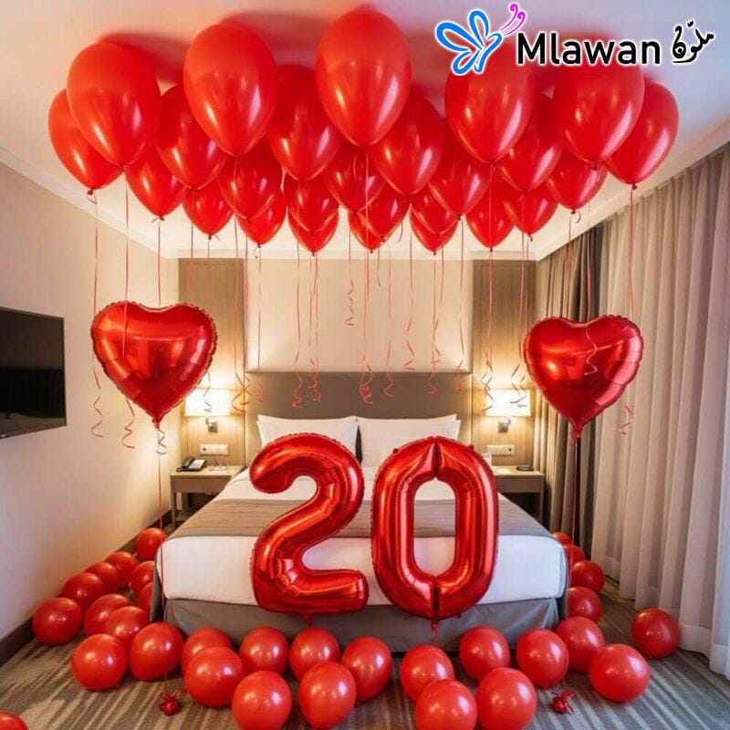 Romantic Dubai hotel room red balloons and hearts.