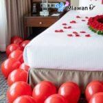 Romantic balloons Dubai Valentines surprise Abu Dhabi room decor rose petals decoration