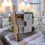 Customizable wooden gift box with golden mirror details.