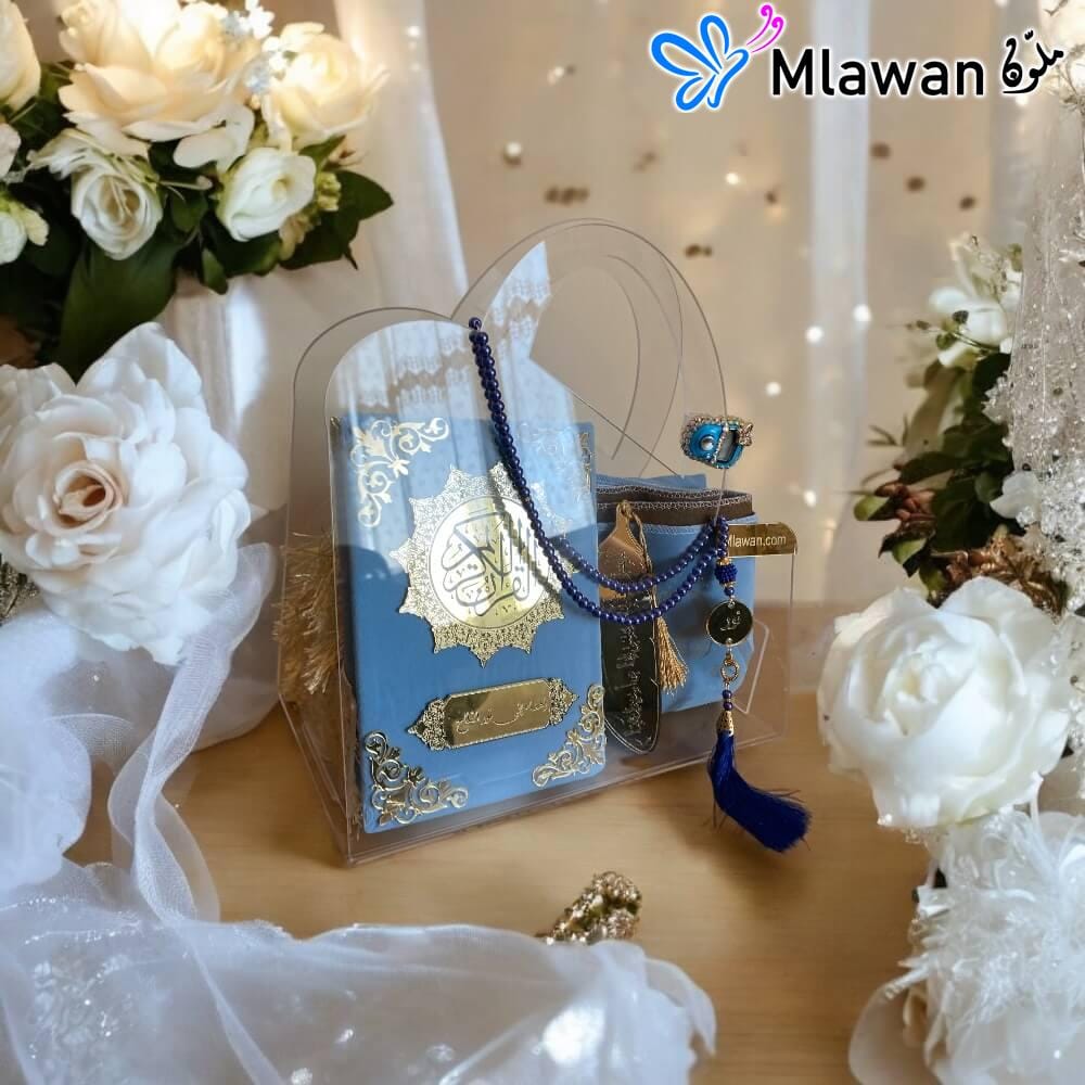 Quran gift set with prayer accessories in a transparent bag. Quran gift set with prayer accessories in a transparent bag.