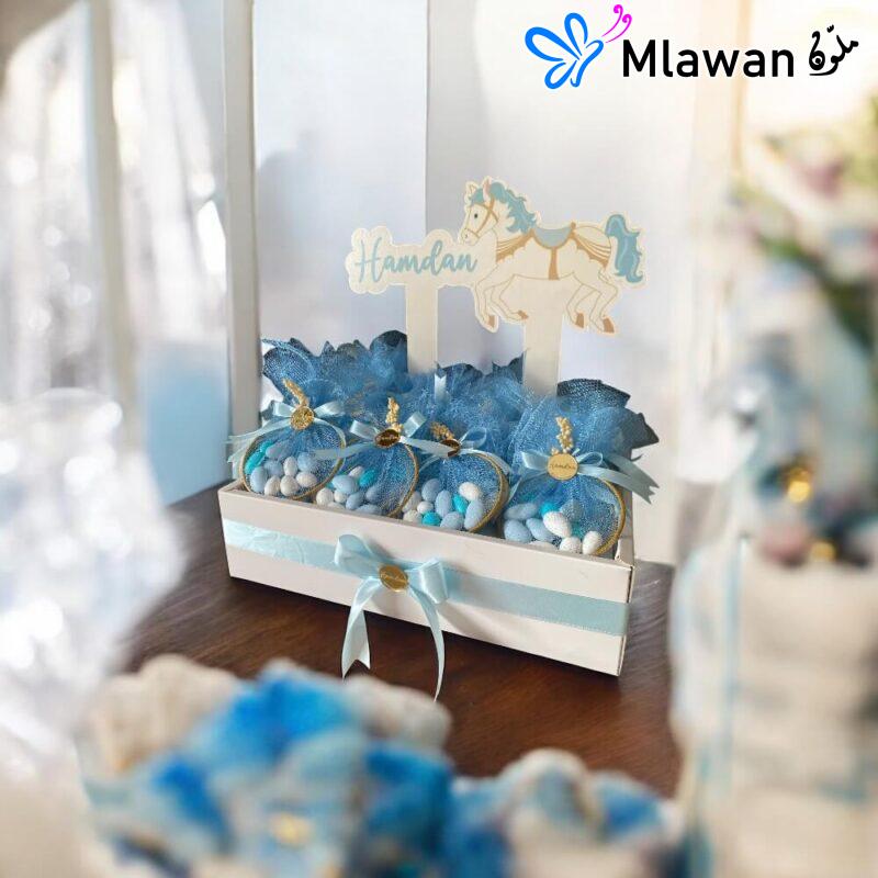 توزيعات مواليد فاخرة بالأسماء