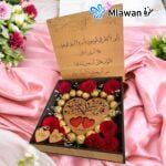 wooden heart stand with engraved names and floral design