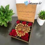 heart shaped wooden box with engravings for names and chocolates
