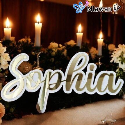 golden name sign for wedding decor