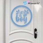 blue boy door sign hanging on white wooden door
