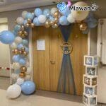 newborn hospital room decoration with balloon arch and custom name sign