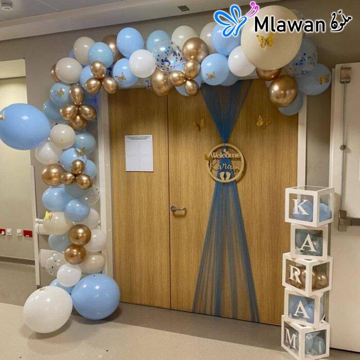newborn hospital room decoration with balloon arch and custom name sign
