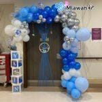 hospital room decoration featuring arc balloons and door signs