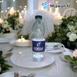 Custom branded water bottles with company logo for corporate events in UAE