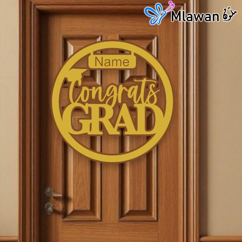 graduation plaque hanging on a decorated front door