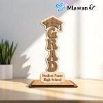Personalized graduation trophy with student name and school engraved