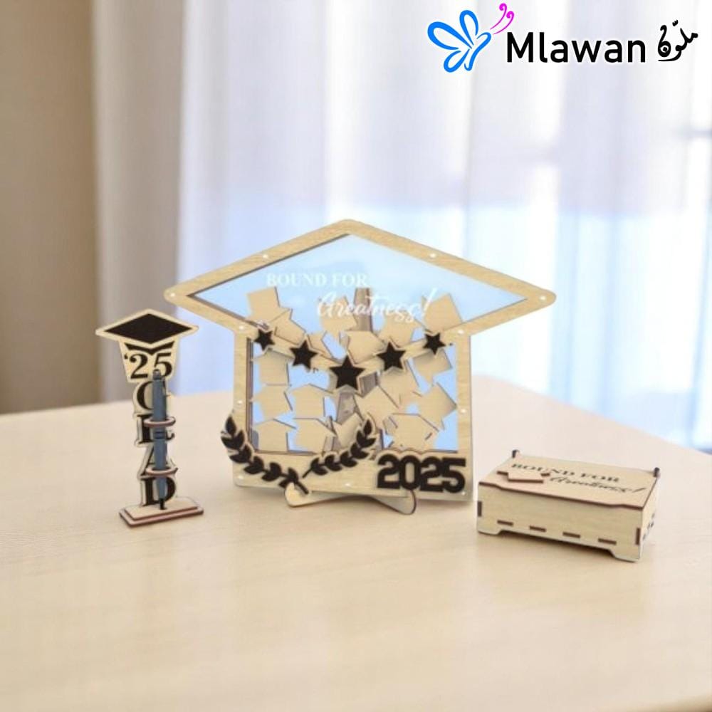 4657 (1) Graduation guest book with pen holder and wooden graduation cap name tags displayed on a table