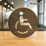 Modern restroom sign guides business guests. Stylish bathroom door sign for offices.