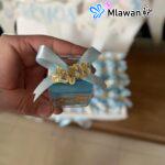 Here are a few options for the alt text, keeping in mind the requirements:* توزيعات مواليد شوكولاتة علب اكريليك هدايا فريدة* توزيعات مواليد شوكولاتة - Personalized Acrylic Name Tags For Baby Shower Chocolate Box Mini Giveaways* توزيعات مواليد هدايا استقبال مولود علب اكريليك* شوكولاتة توزيعات مواليد هدايا استقبال فريدة* علب اكريليك مواليد توزيعات شوكولاتة فريدة
