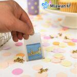 Here are a few options, depending on the focus:* Baby shower favors Mini Acrylic Bag chocolate* Acrylic bag baby shower giveaway personalized tag* Chocolate filled mini bag baby shower favor - Baby shower giveaway Mini Acrylic Bag with chocolate and name tag