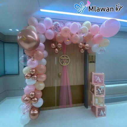 Baby girl hospital welcomeHospital room decoration setup to welcome a newborn baby girl - balloon arch custom welcome sign American Hospital Dubai