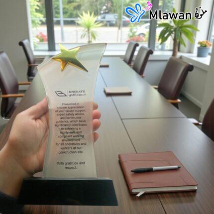 Crystal trophy golden star black base.