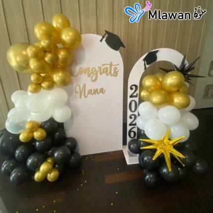 Graduation balloon arch backdrop
