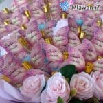 Elegant pink gradient musk perfume in butterfly shape for graduations