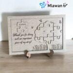 teacher appreciation sign with puzzle design and engraved message.