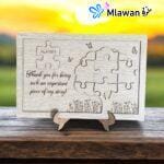 teacher gift with personalized engraved name on wooden puzzle sign.